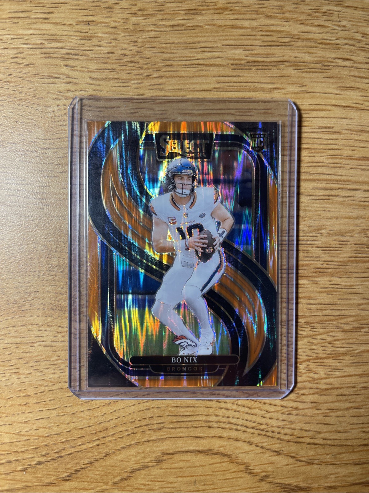 2024 Panini Select - Premier Level Bo Nix #117 Orange Prizm /399 (RC)