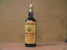 COLLECTABLE CIGARETTE LIGHTER IN SCOTCH BOTTLE-VERY OLD-VINTAGE