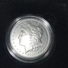 2021 $ 1 “MORGAN DOLLAR”  0.858 Troy Ounce 99.9% Silver, Features “O” Privy mark