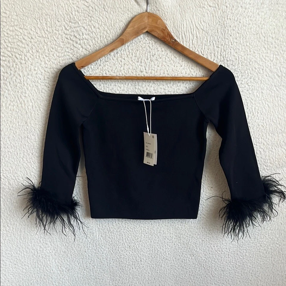 Top Lucy Paris Joyce para mujer XS negro fuera del hombro puño de plumas Foto 2 de 4