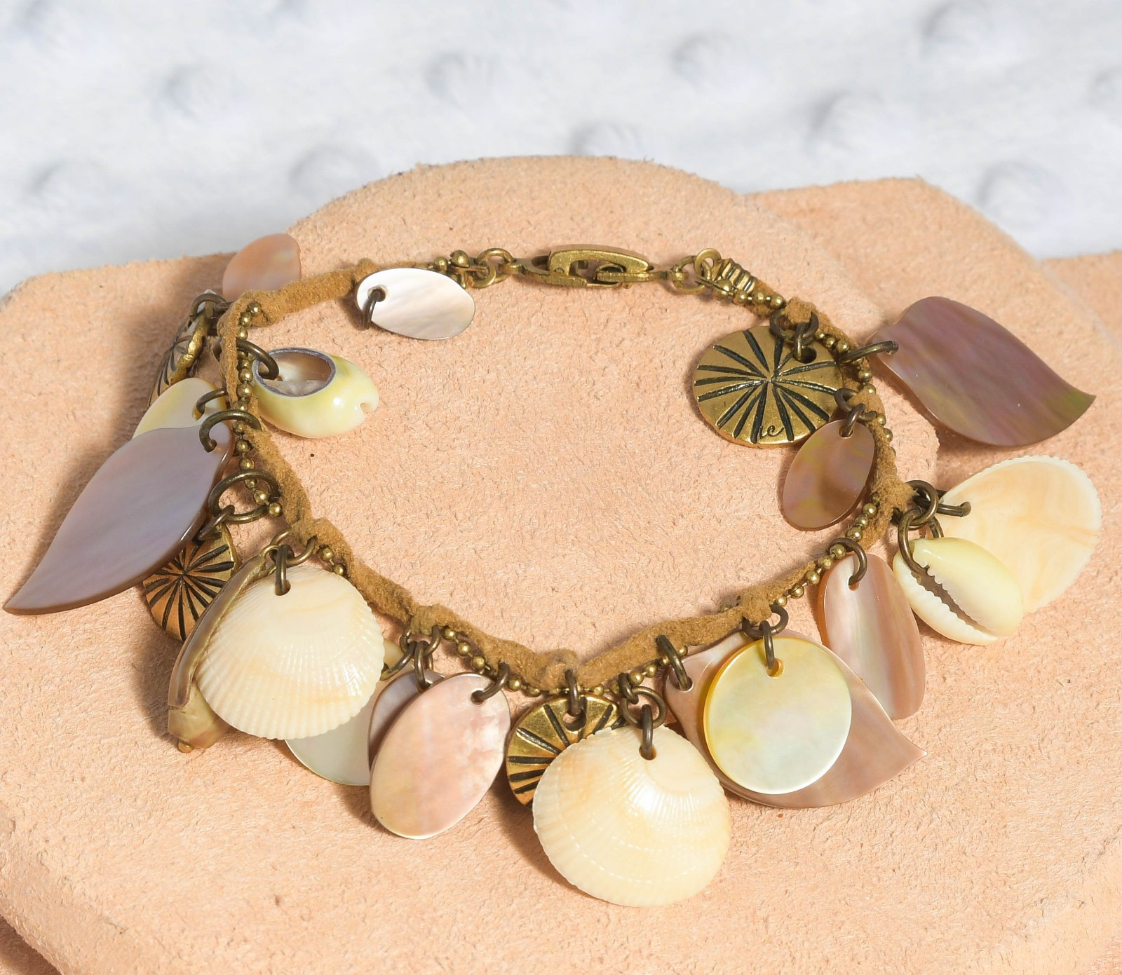 Vintage Lauren Conrad bracelet with shells and gold textured accents