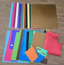 CRICUT VINYL SHEETS -  12" x 12"  SOLID COLOR - 15  full sheets & some part used