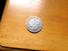 1884-0 Morgan Silver Dollar