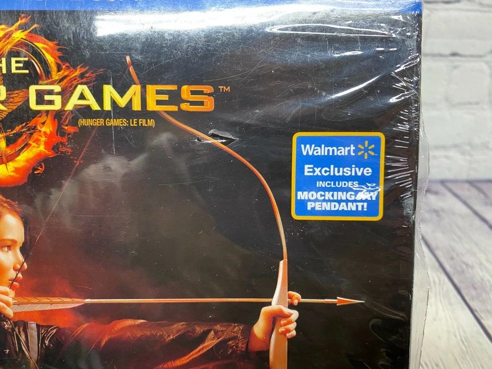 The Hunger Games Movie Blu Ray Walmart Exclusive with Mocking Jay Pendant New - Image 4 of 4