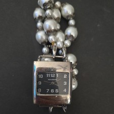 Narmi Silver Tone Women’s Bracelet Quartz Watch