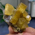 90G Shiny Golden Cuboid Barite Crystal Based on the Purple Spherical Fluorite