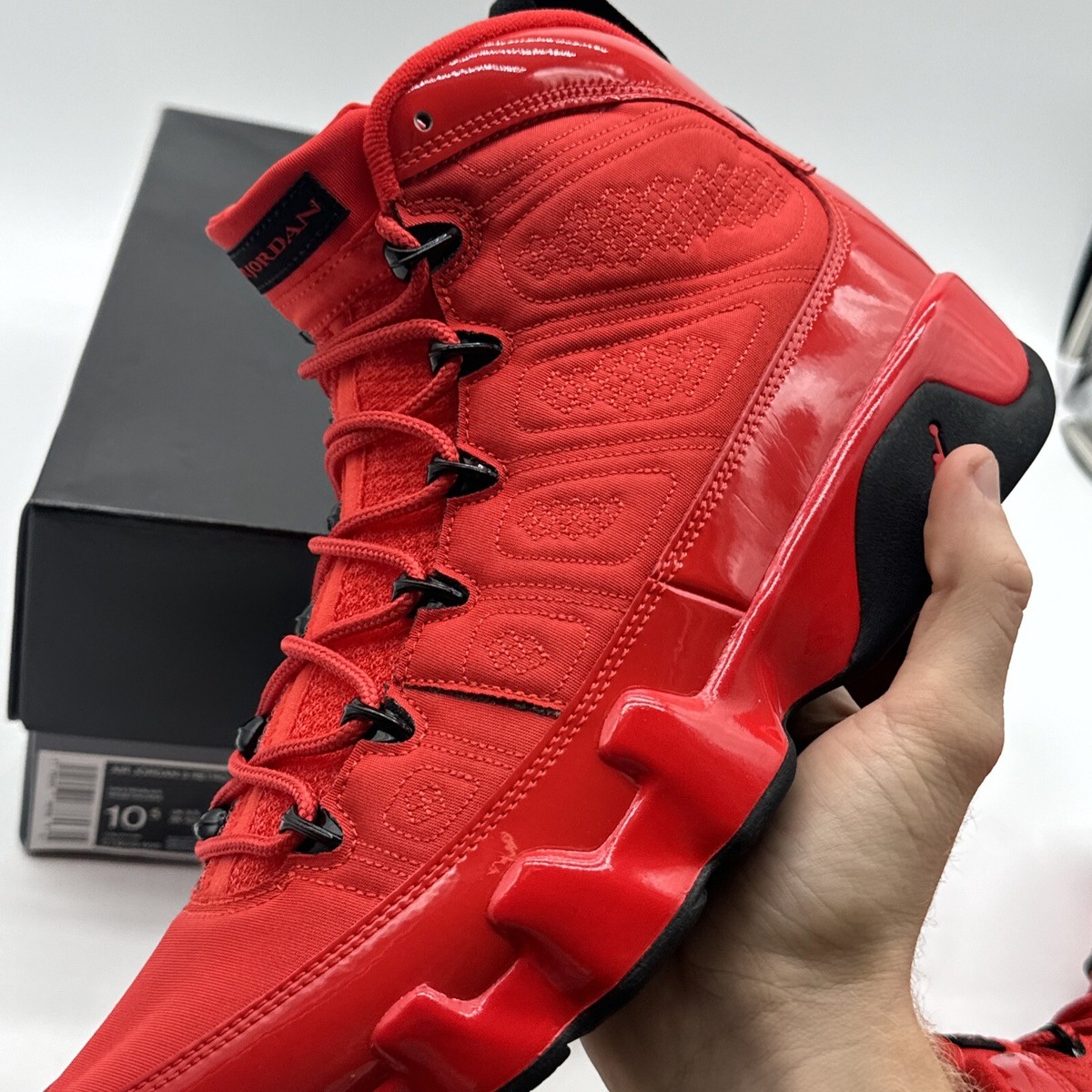 red black shiny jordans