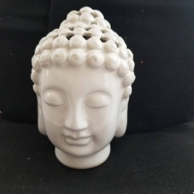 ASIAN BUDDHA CERAMIC HEAD WITH A CALMING FACE AND UNOPENED SCENTED BAG INSIDE