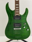 Green SCHECTER PA-SW/TH/See-Thru electric guitar with silver hardware, black pickups, and flamed maple fretboard.