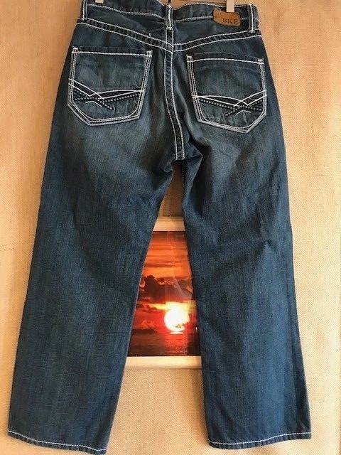 Buckle blue jeans sales