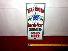 3 3/4 x 8 1/2 in YEAR ROUND PANCAKE FLOUR ADV. SIGN HEAVY METAL PORCELAIN - Z423