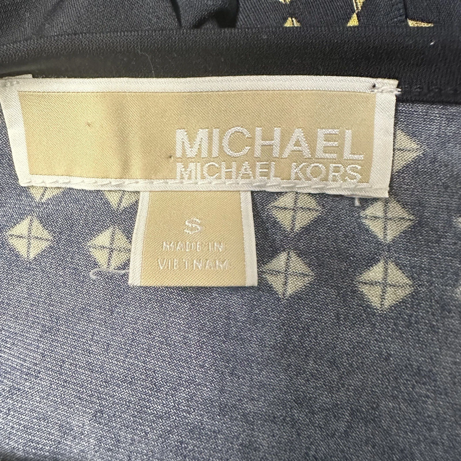 Abito tunica Michael Kors nero oro motivo geometrico piccolo manica lunga elasticizzato