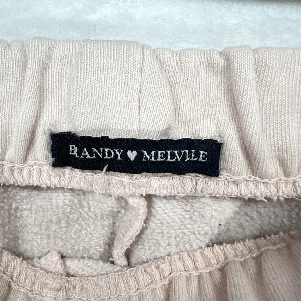 Pantalones Cortos Brandy Melville Para Mujer Pequeños Rosa Pastel Sudor Dobladillo Crudo Cintura Elástica Gimnasio Foto 4 de 4