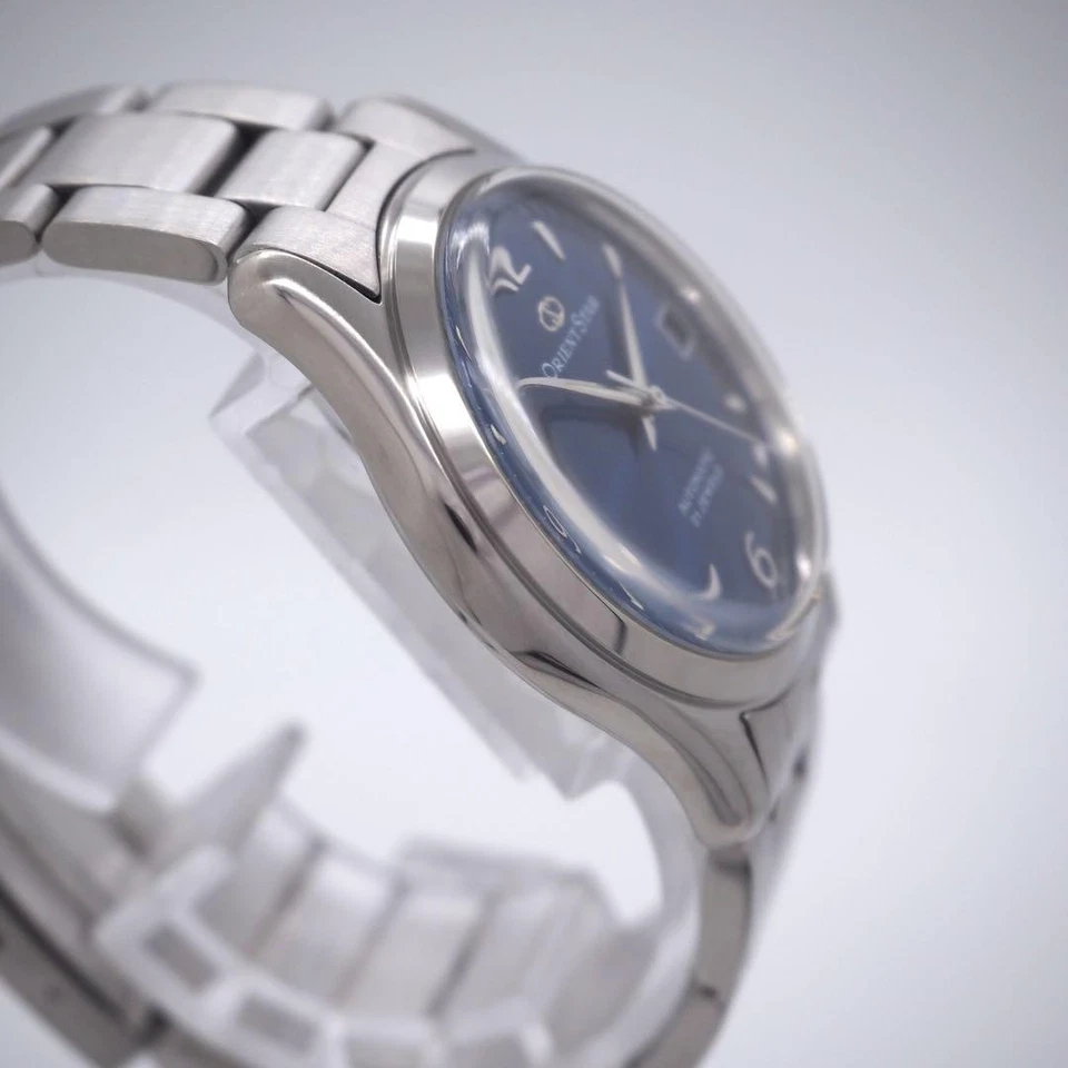 Reloj automático Orient Star para hombre Explorer esfera azul correa plateada 34,5 mm Foto 4 de 4