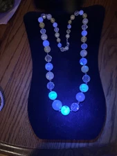 plastic clear and yellow tint some beads glow with black light