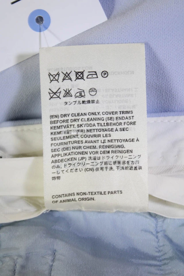 Pantalones ACNE Studios para mujer con botones laterales tiro alto pierna ancha azul hielo talla 40 EUR Foto 4 de 4