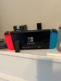 Nintendo Switch console with dock + cables + remotes