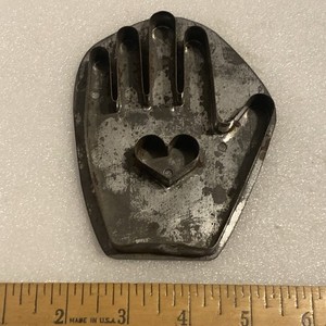 ANTIQUE SOLDERED TIN HEART IN HAND COOKIE CUTTER
