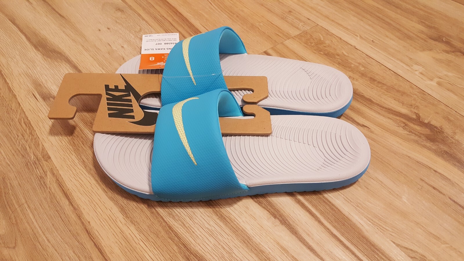 blue nike flip flops