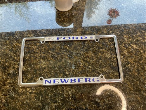 Newberg Oregon Loren Berg Ford Embossed Metal License Plate Frame Tag Holder - 第 1/4 張圖片