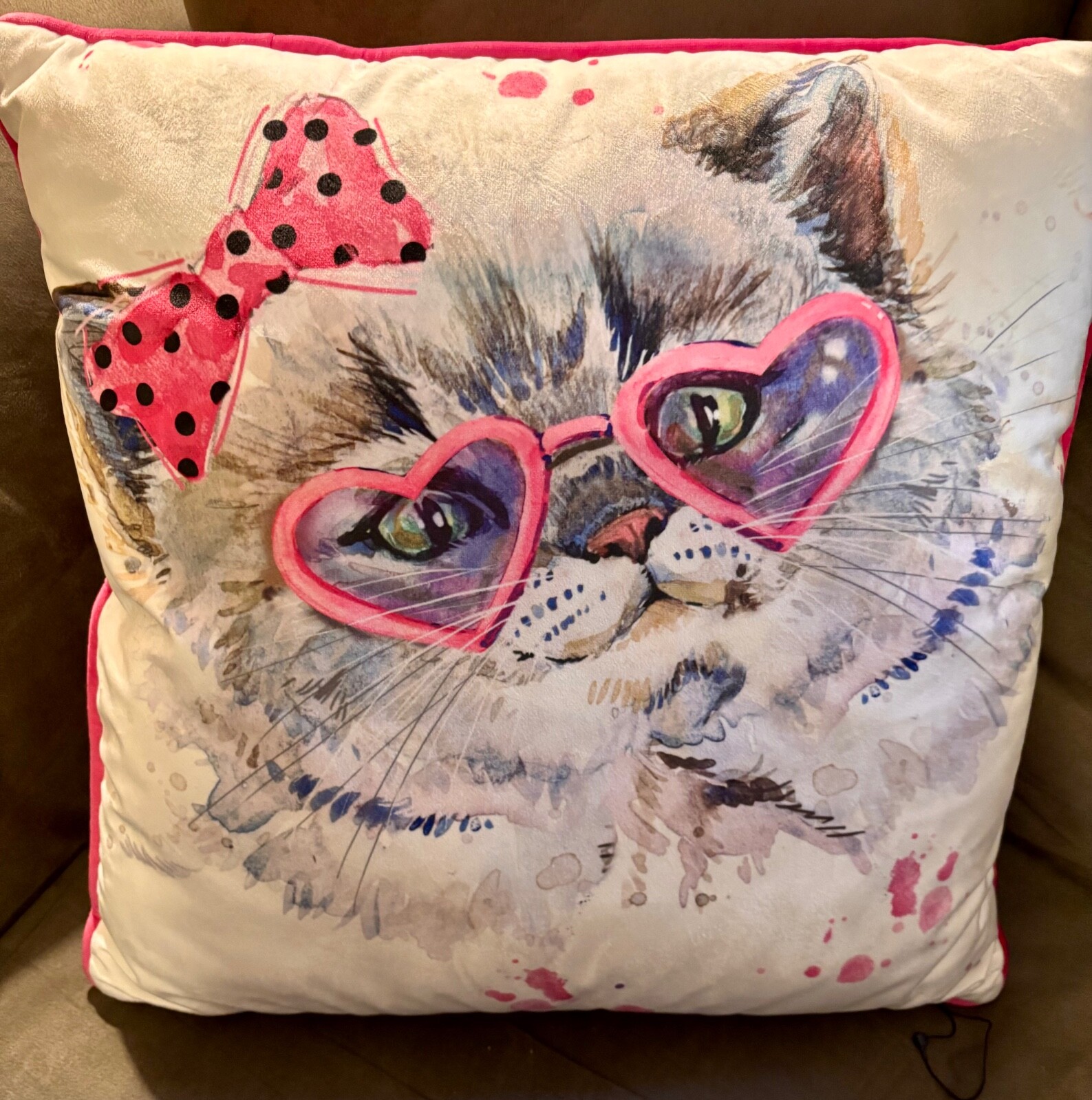 Nicole Miller Cat with Purple and Fuchsia Pair Down Pillows on Cream