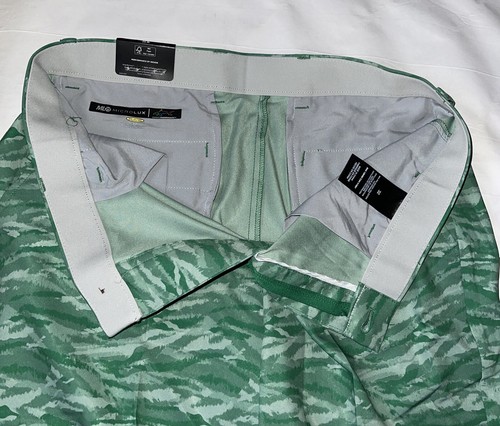 Pantalones cortos de golf Greg Norman ML75 Microlux Performance para hombre talla 32 verde juguetón camuflado - Imagen 8 de 11