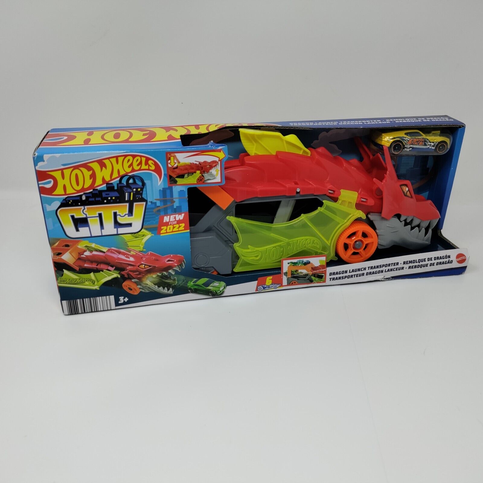 Jeux de voiture Transporteur Dragon Lanceur et 1 Véhicule Mattel