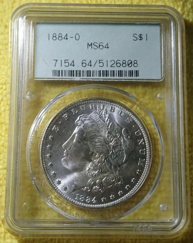 PCGS  / MS - 64 / 1884 O / MORGAN DOLLAR