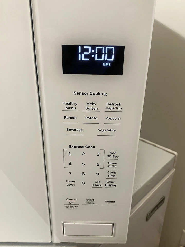 GE Profile PEB7227DL4WW 2,2 Cu. Sensor integrado Ft 1100 vatios blanco ¡como nuevo! Foto 2 de 4