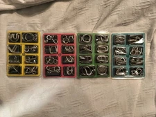 32 Metal Wire Puzzles Brain Teasers New In Box With Solution Cards