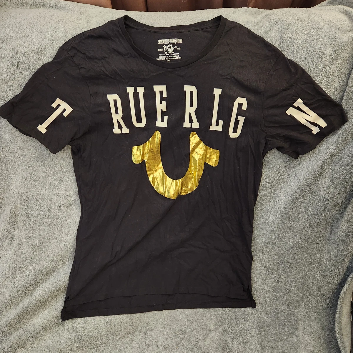 black and yellow true religion shirt