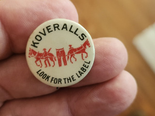 early Pinback Button adv Levi Strauss KOVERALLS w Jean Pulling Horses Logo