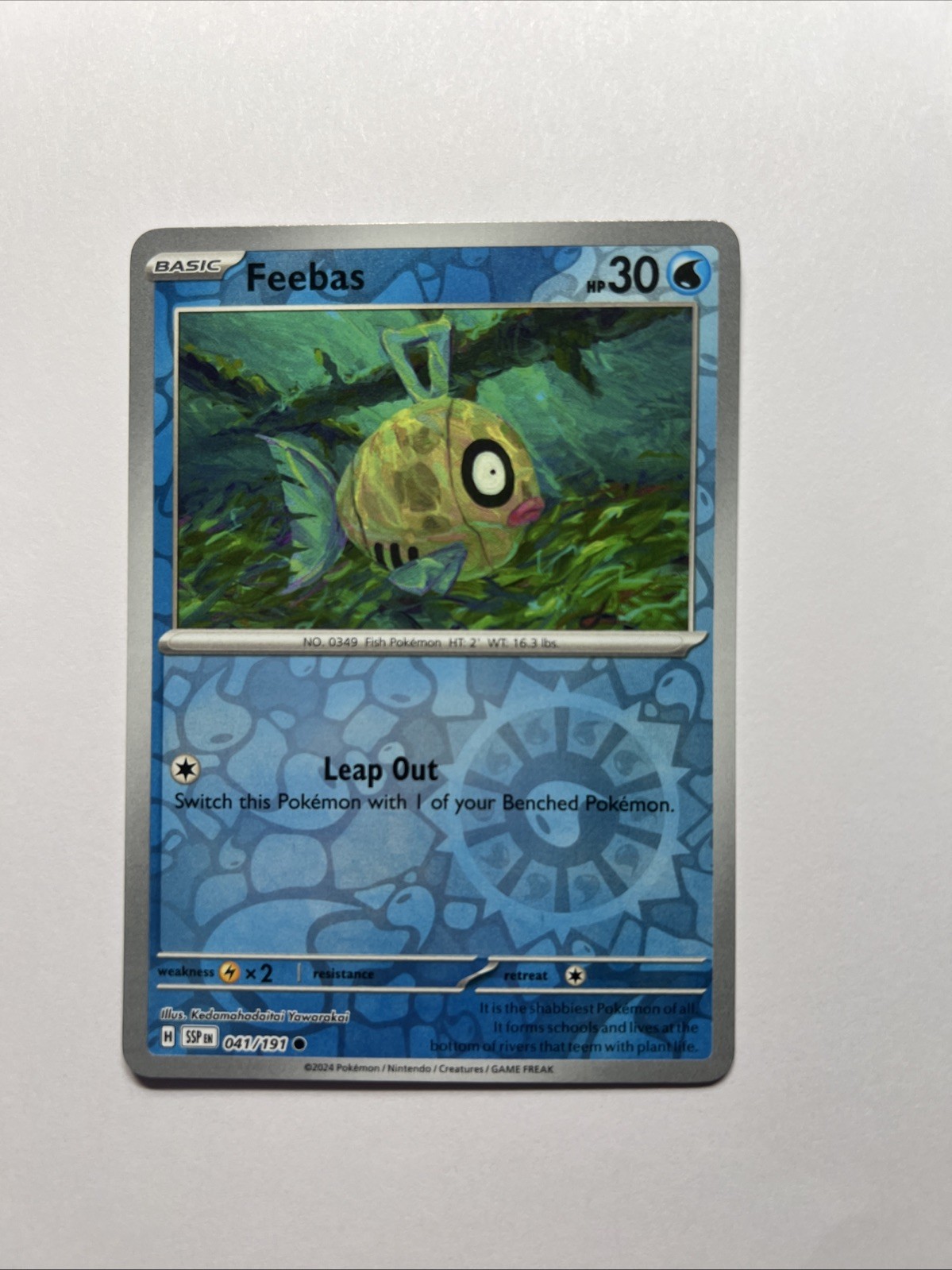 Feebas 041/191 Pokemon SV08: Surging Sparks Common Reverse Holo NM