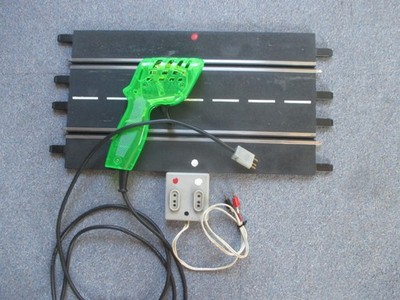 DS - Drücker (Umbau auf Carrera Universal) plus Stromschiene für 2-Leiterbetrieb