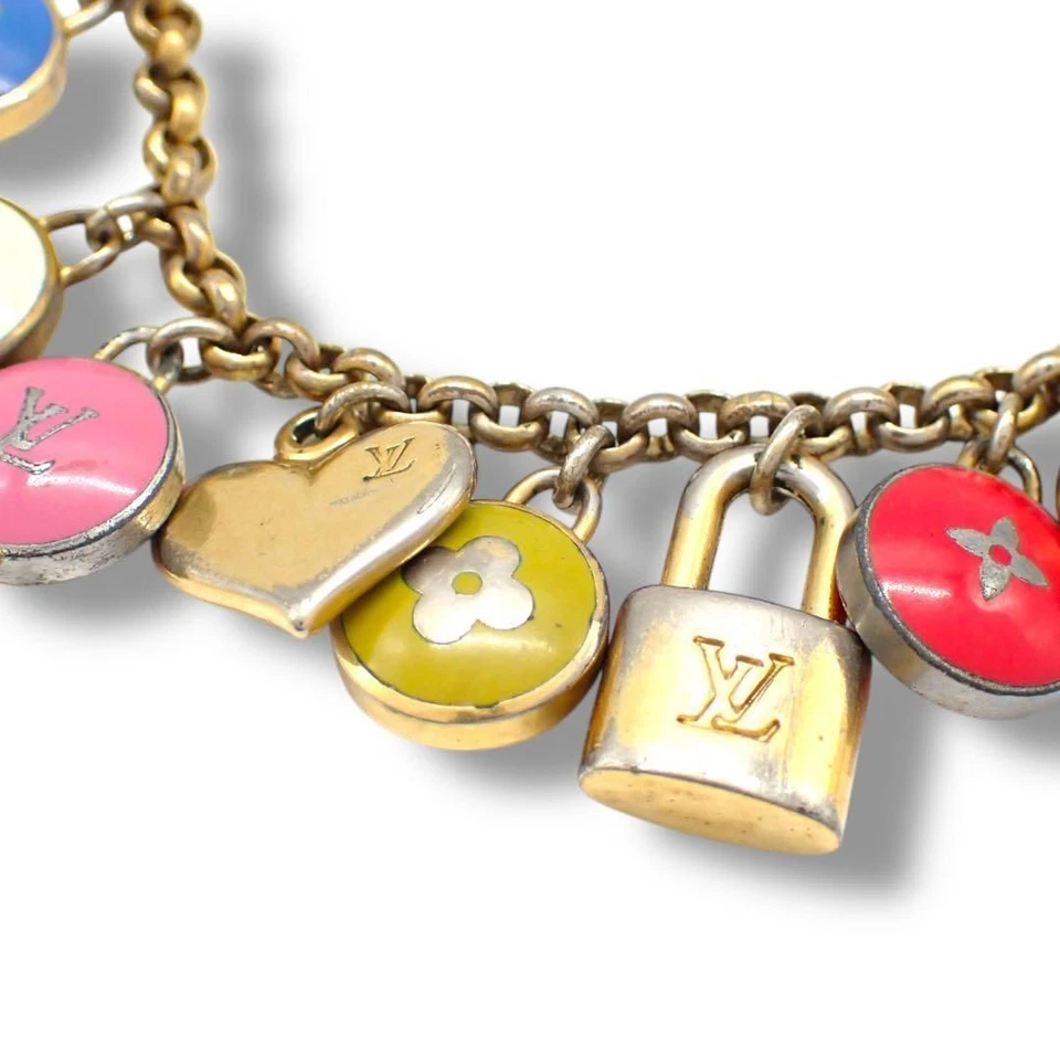 Porte-clés breloque sac LOUIS VUITTON Porto Cle Chenne Pastille M65380 Occasi... - Photo 2/4