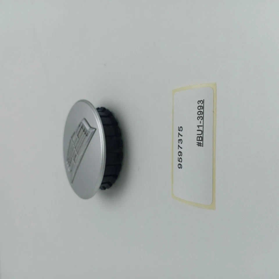 Cadillac CT6 2005-2017 tapa central plateada 9597375 Foto 4 de 4