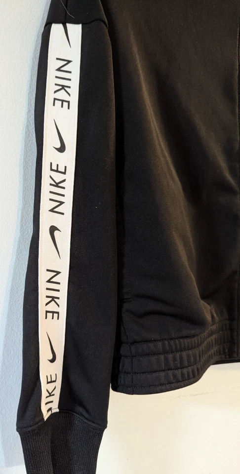 Nike -Ropa deportiva clásica niña chándal chaqueta - negro con acento blanco - talla XL Foto 4 de 4