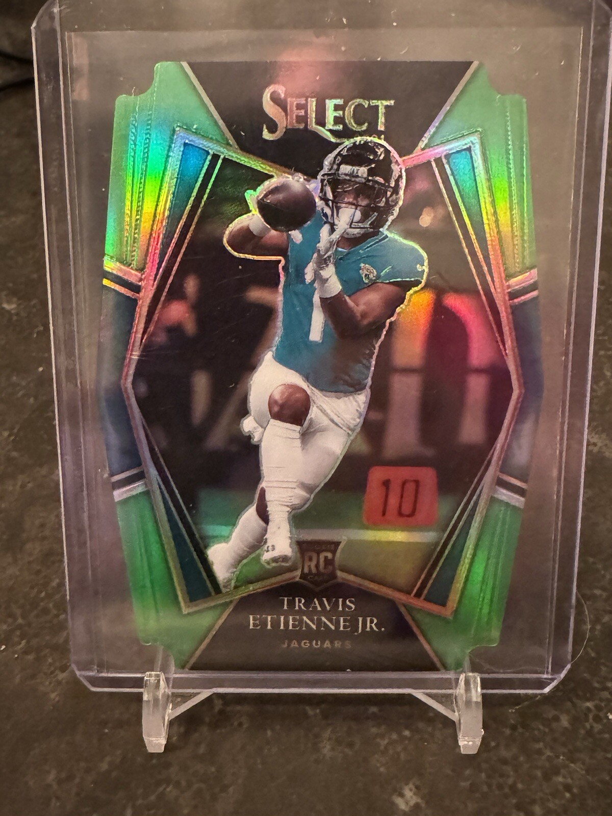 2021 Panini Select Premier Level Neon Green Prizm Die-Cut Travis Etienne /349