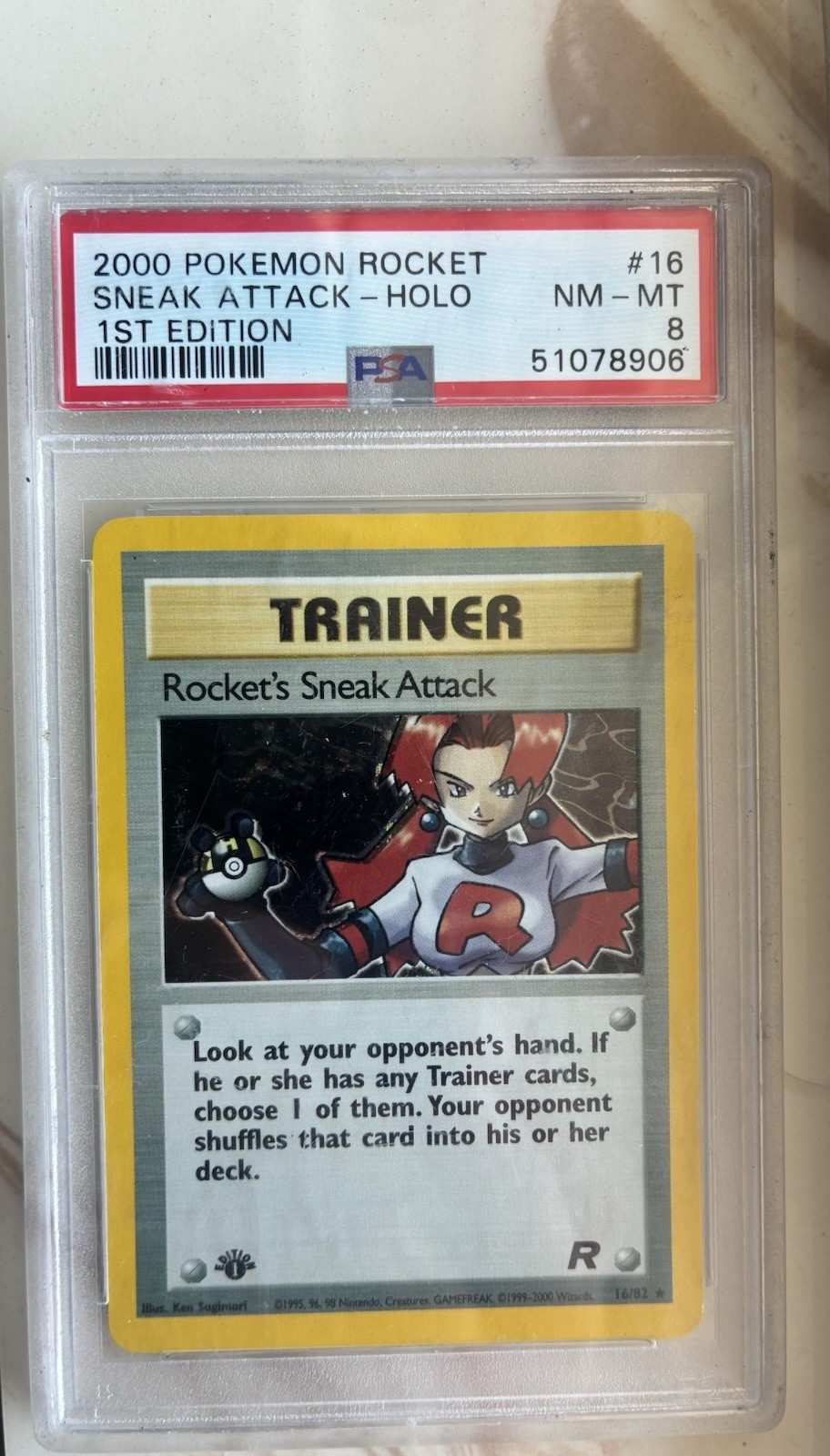 Rocket's Sneak Attack 16/82 Team Rocket Holo 1st edition PSA 8