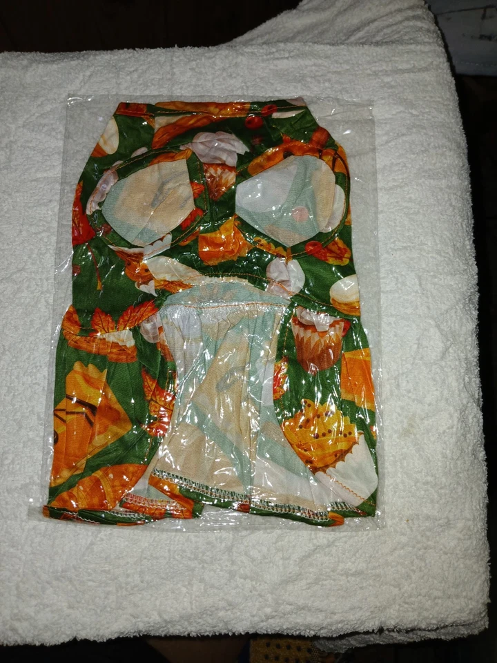 Vestido verde estampado calabaza talla XS para perro con lazo de pelo a juego Foto 2 de 2