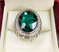 BEAUTIFUL OVAL GREEN STONE W/HALO CENTER SET IN STERLING SILVER RING; SIZE 6.5