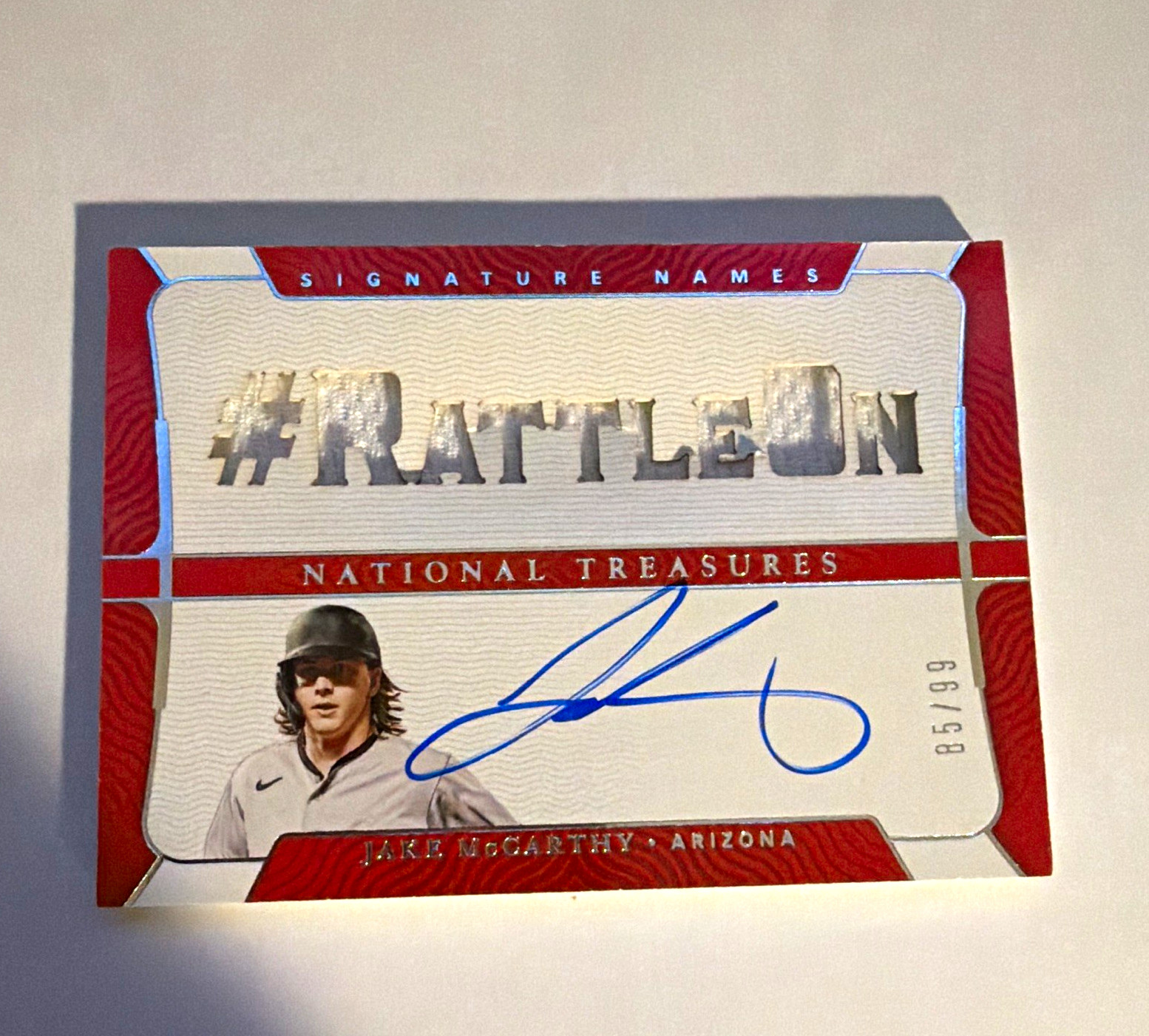 Panini 2022 National Treasures Jake McCarthy #RATTLEON Auto SN-JM 85/99 view 1