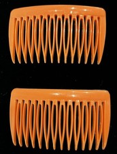 Vintage 1980s Orange Wil-Hold Plastic Side Hair Comb Set of 2
