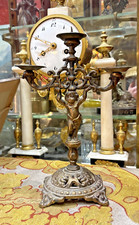 ancien bougeoir pique cierge en bronze laiton XXe a decor d ange putti angelot