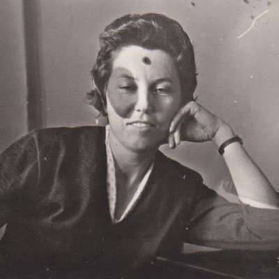 Young Woman Double Exposure Surreal Light Marks And Quiet Gaze Vintage Photo