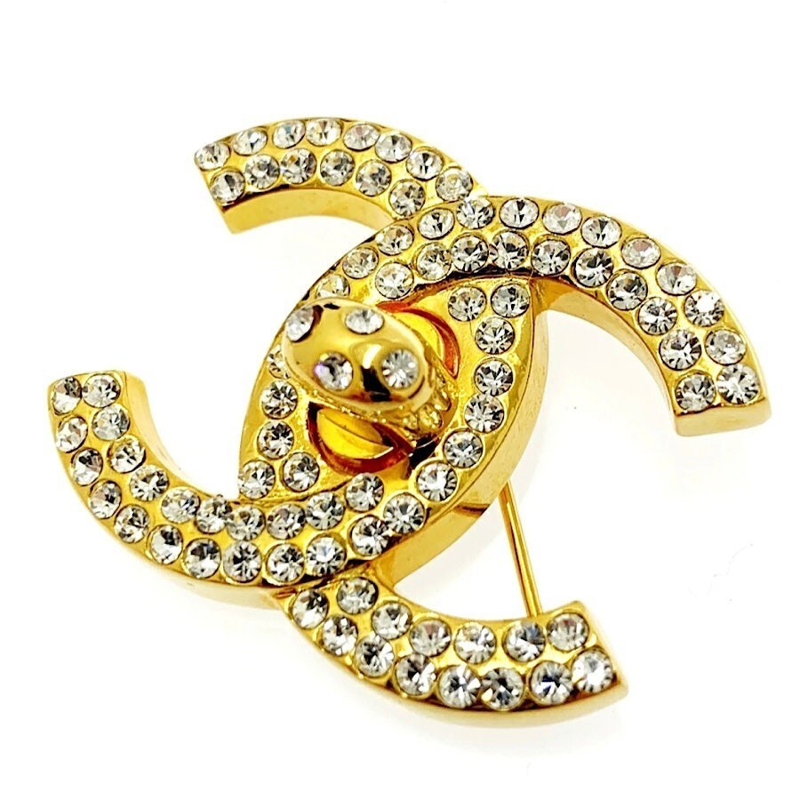 Brooch   Interlocking CC Pin Brooch Chanel Crystal Interlocking CC Lifesaver Silver-Tone Brooch  main image 4