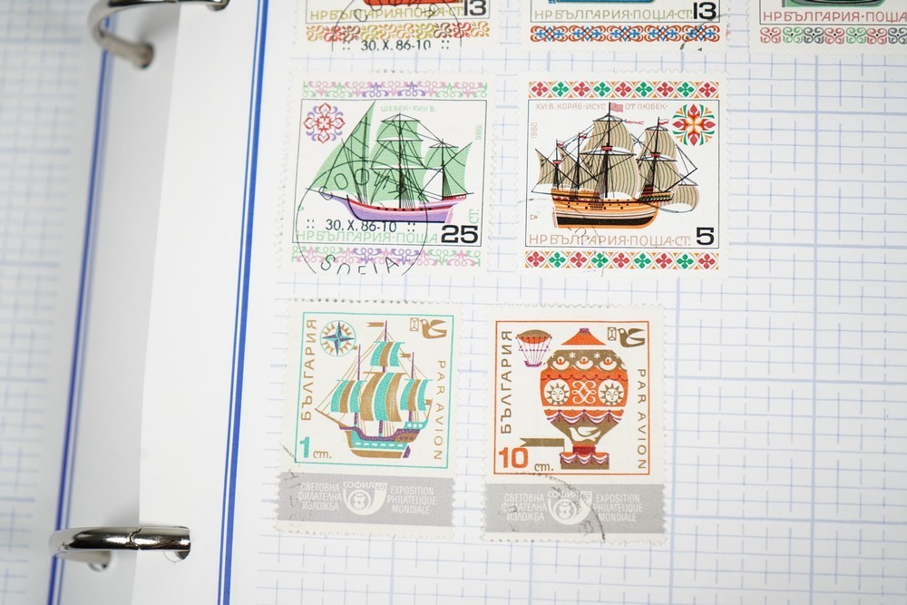 WORLDWIDE COLLECTION OF 3,000+ STAMPS MINT & USED STORED IN MYSTIC ALBUM