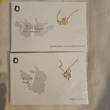 Pokemon Pikachu Gold Tone Necklace Set with HAPPY DAYS and SMILE Designs