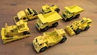 Lot of 7 vtg Hot Wheels CAT construction trucks: earth mover, wheel loader, more