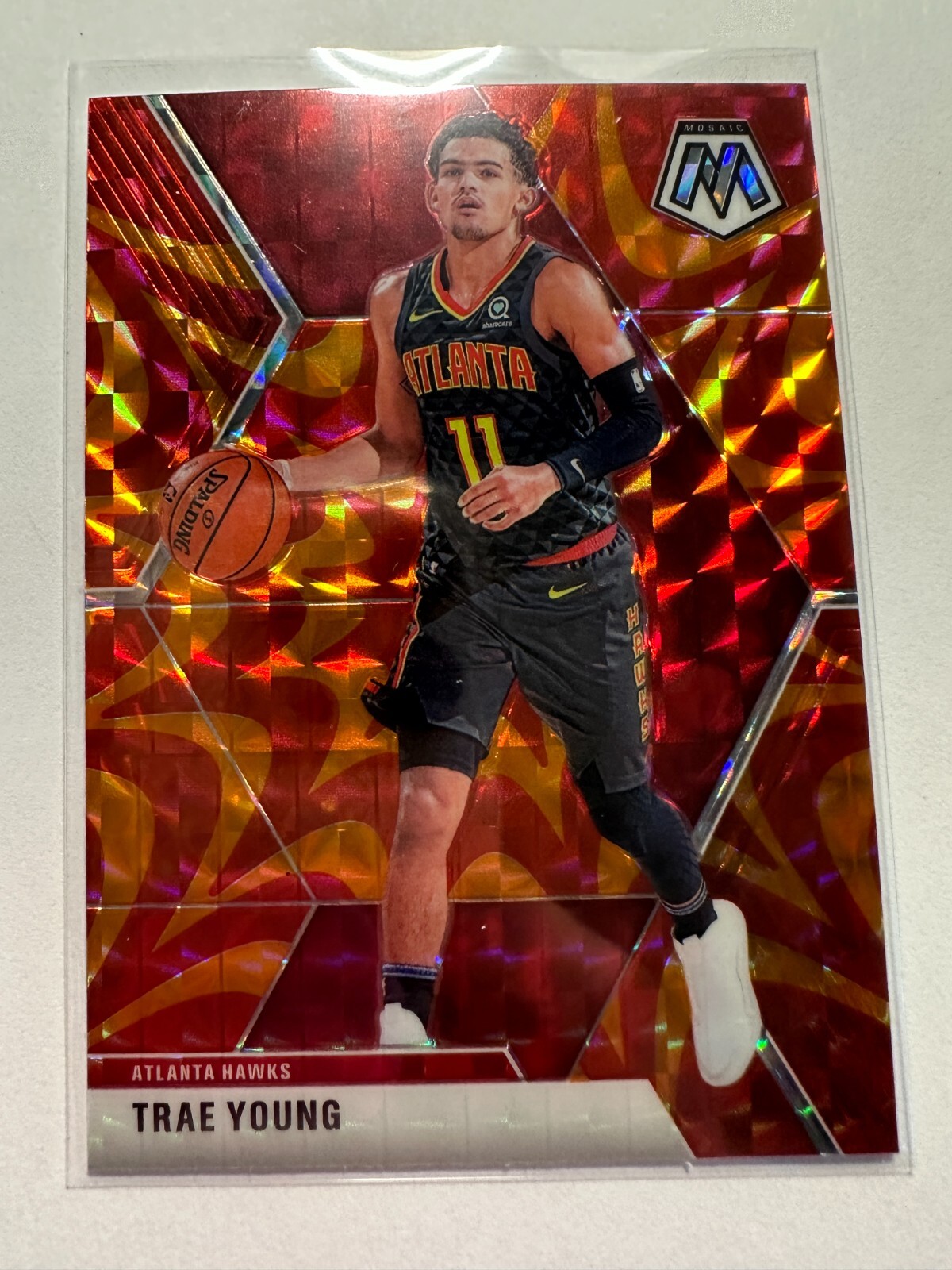 K69,064 - 2019-20 Panini Mosaic Mosaic Orange Reactive #182 Trae Young